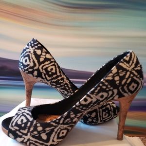 3.5 inch patterned black and white shoes.